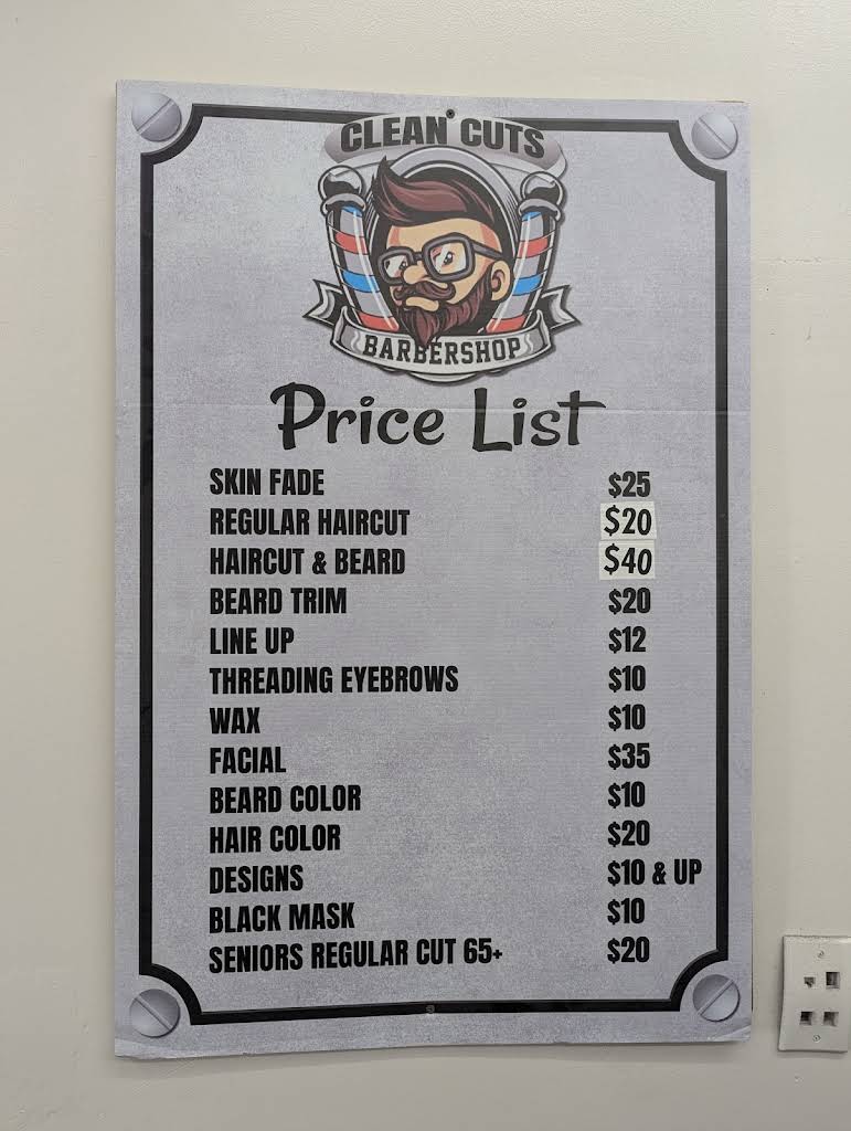 The actual photographed Clean Cut price list, including the illustrated barber logo